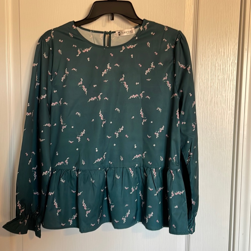 Free with additional purchase. Abyoxi peplum blouse green